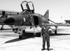 Jerry Ross standing next to RF-4C he flew in while in Test Pilot School at Edwards Air Force Base

