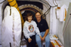 Karen and Jerry in the launch pad's White Room outside the hatch of Space Shuttle Endeavour. Just before launch of STS-88