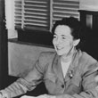 Helen at desk, 1940s or 50s